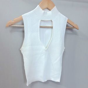 Miss Love size small, bright white crop tank. New without tags.